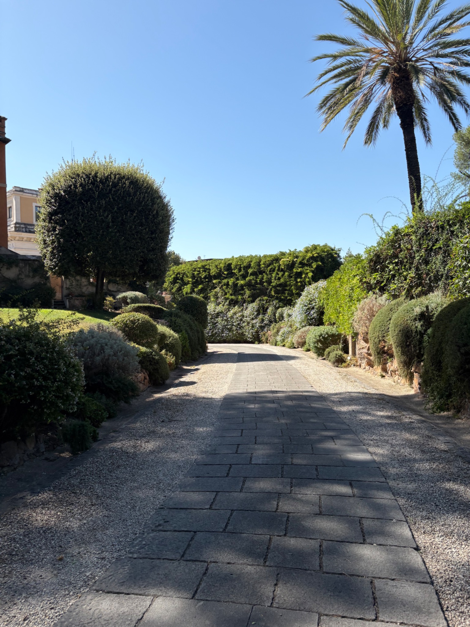 Yellow exterior of Villa Aurelia in Rome